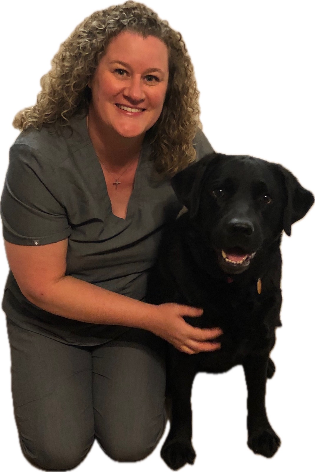 Jesica Golightly, owner of Cozi Paws Pet & House Sitting, with a black Labrador