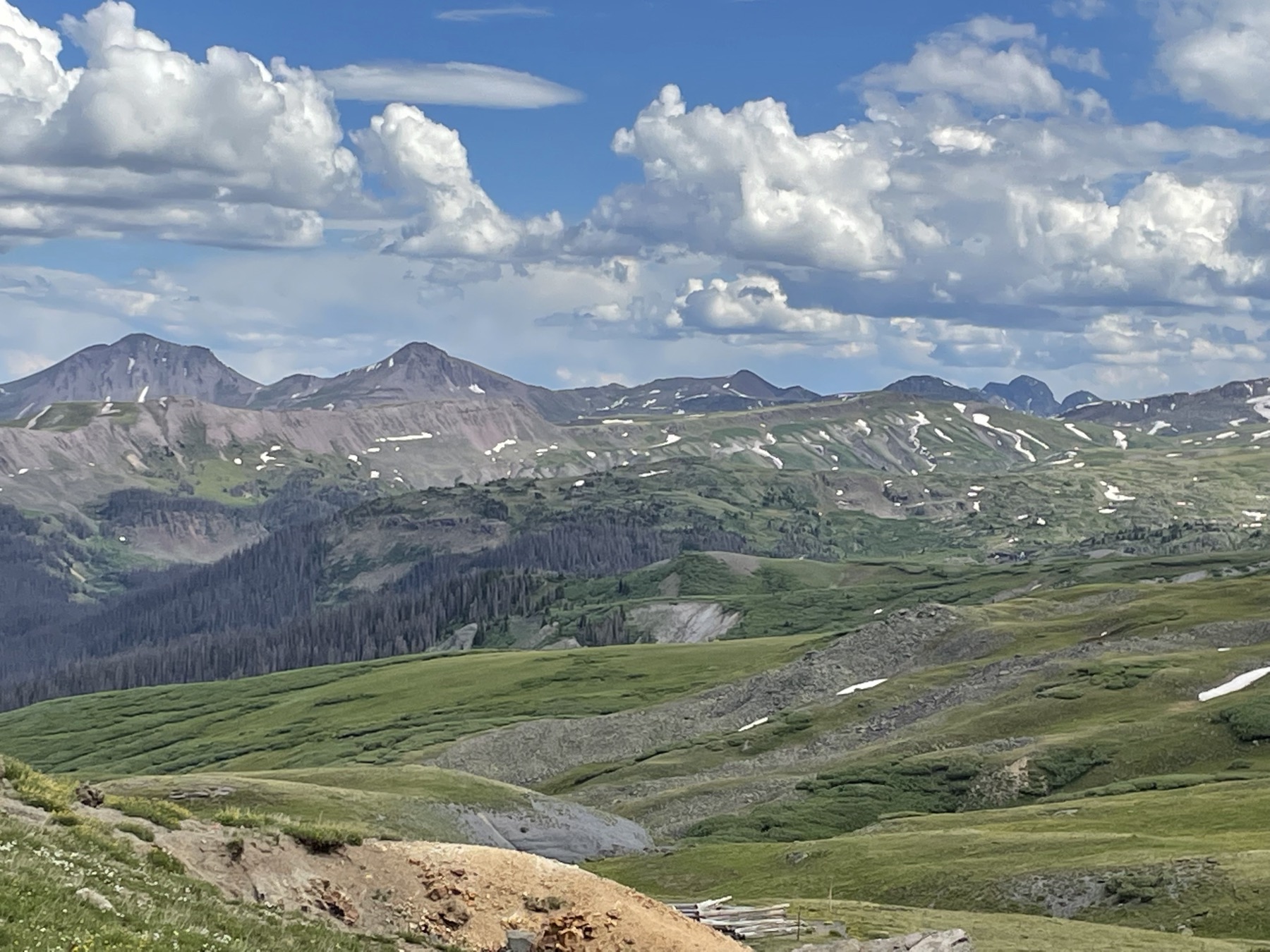 Green alpine valley and mountain peaks near South Fork, Colorado